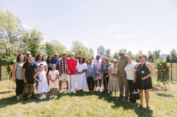 Joe Howard, dressed in plaid and sixth from the left, represents his Harris ancestors at the Brown-Harris Cemetery dedication in June 2024._Courtesy of the City of Dublin.jpg